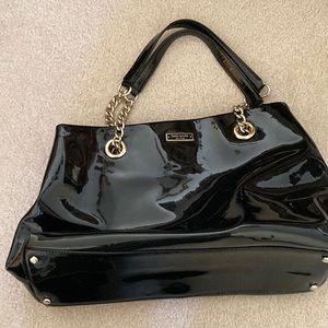 Kate Spade Black patent leather black excellent condition Comes with cloth bag